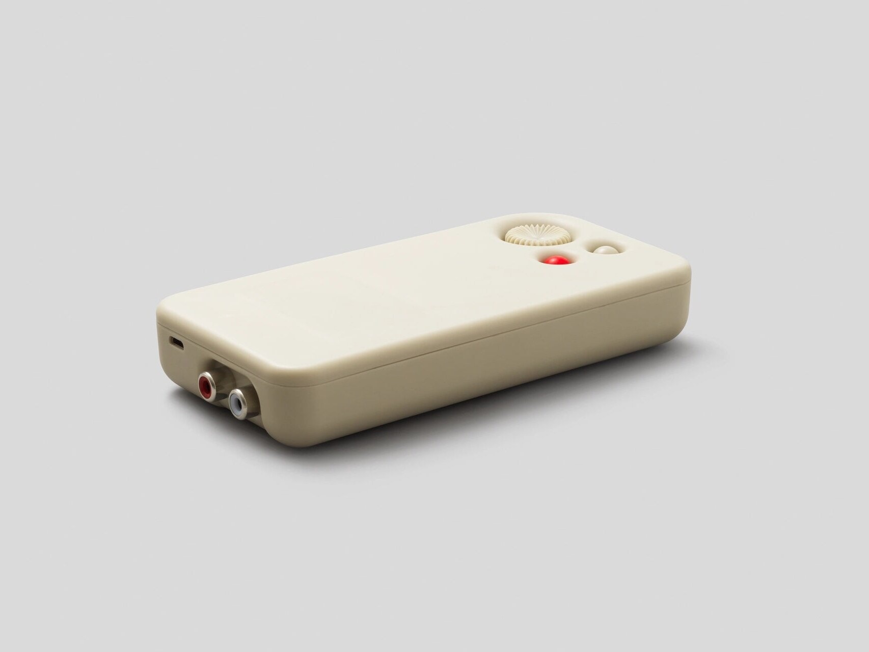 A Blast Box lying flat, showing its RCA inputs and controls.