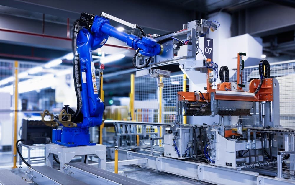 An industrial robot arm on a production line